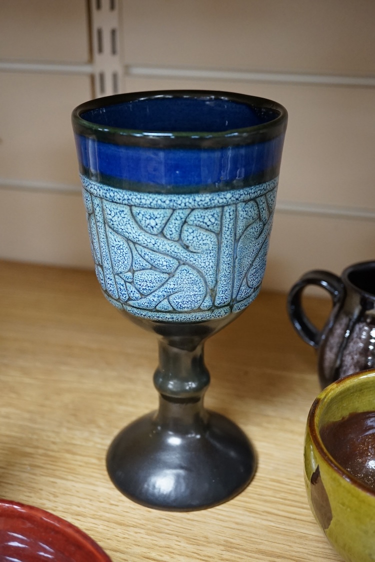 A collection of studio pottery to include a Celtic pottery Newlyn goblet, various jugs and bowls, largest 19cm high